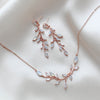 Rose gold necklace and earrings for bride with white opal crystals - APRILLE - Treasures by Agnes