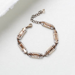 Lydia Art Deco bridal bracelet by Treasures by Agnes, handcrafted with Austrian crystals in an antique gold finish – vintage-inspired wedding jewelry.