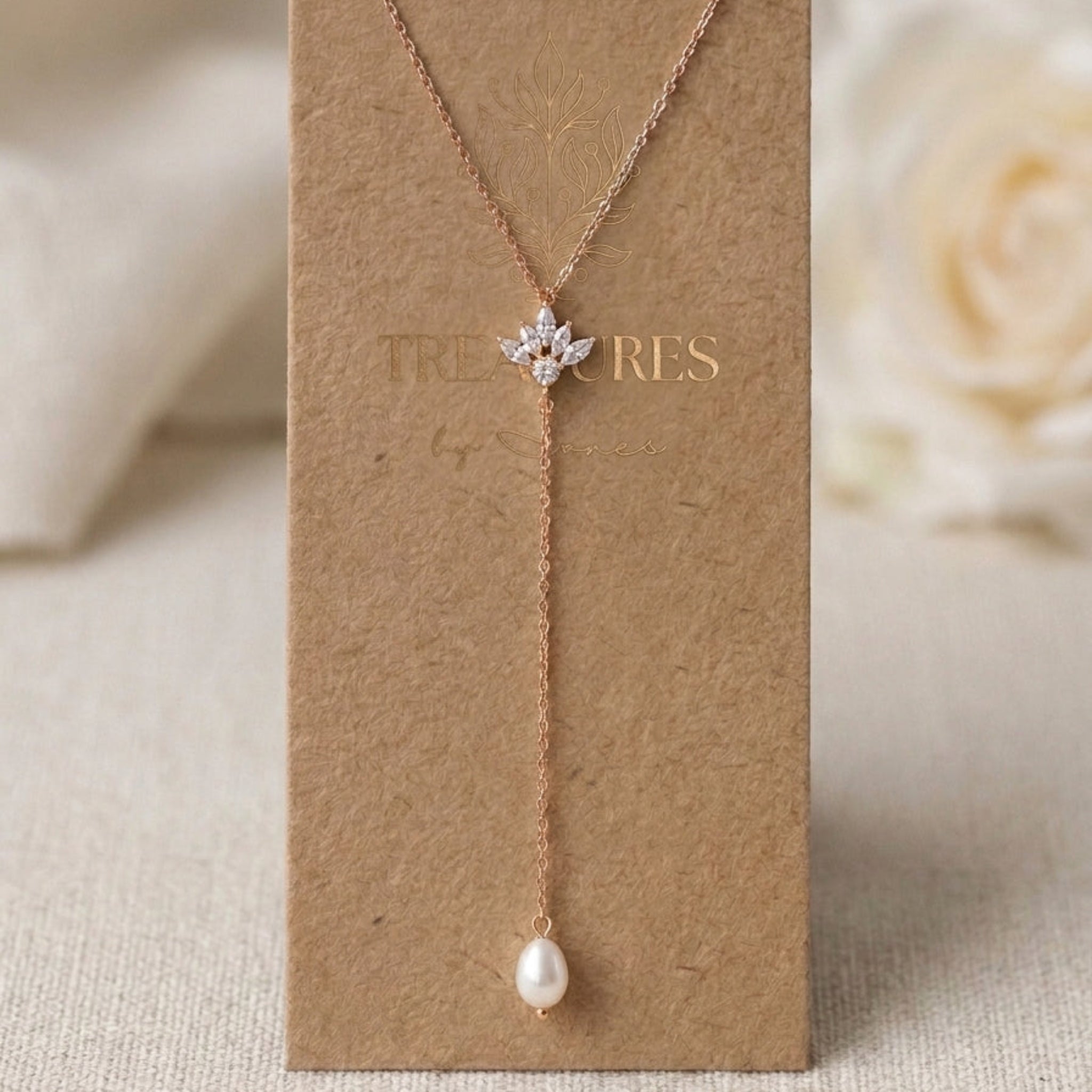 Emma rose gold bridal lariat necklace with CZ centerpiece and elegant pearl drop by Treasures by Agnes.