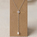 Emma silver CZ and pearl lariat bridal necklace with delicate Y-chain and pearl drop by Treasures by Agnes.