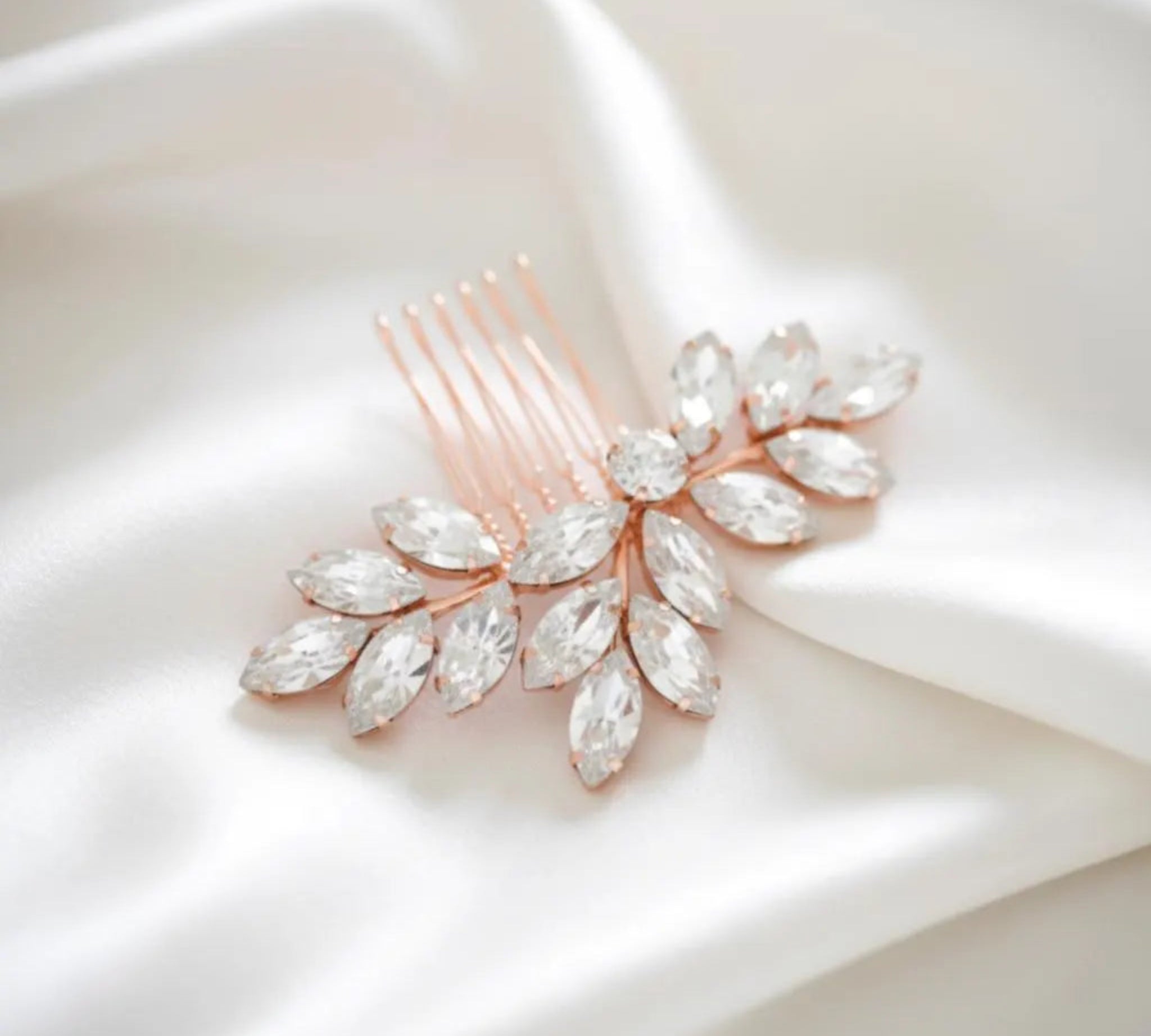 Juliette rose gold Swarovski crystal bridal hair comb featuring marquise crystal leaves by Treasures by Agnes.