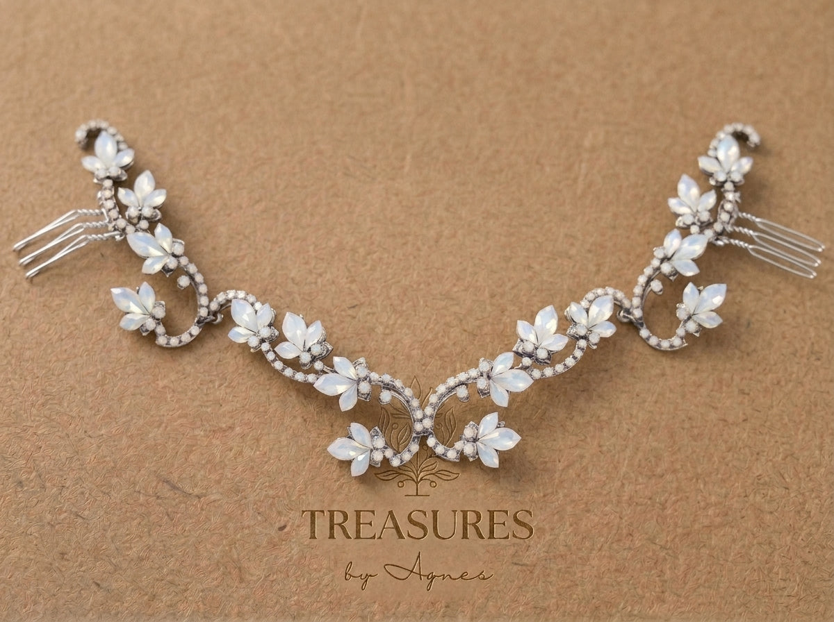 Silver Cleo wedding hair accessory with Swarovski white opal marquise crystals arranged in floral clusters along a symmetrical crystal-encrusted bridal hair vine.