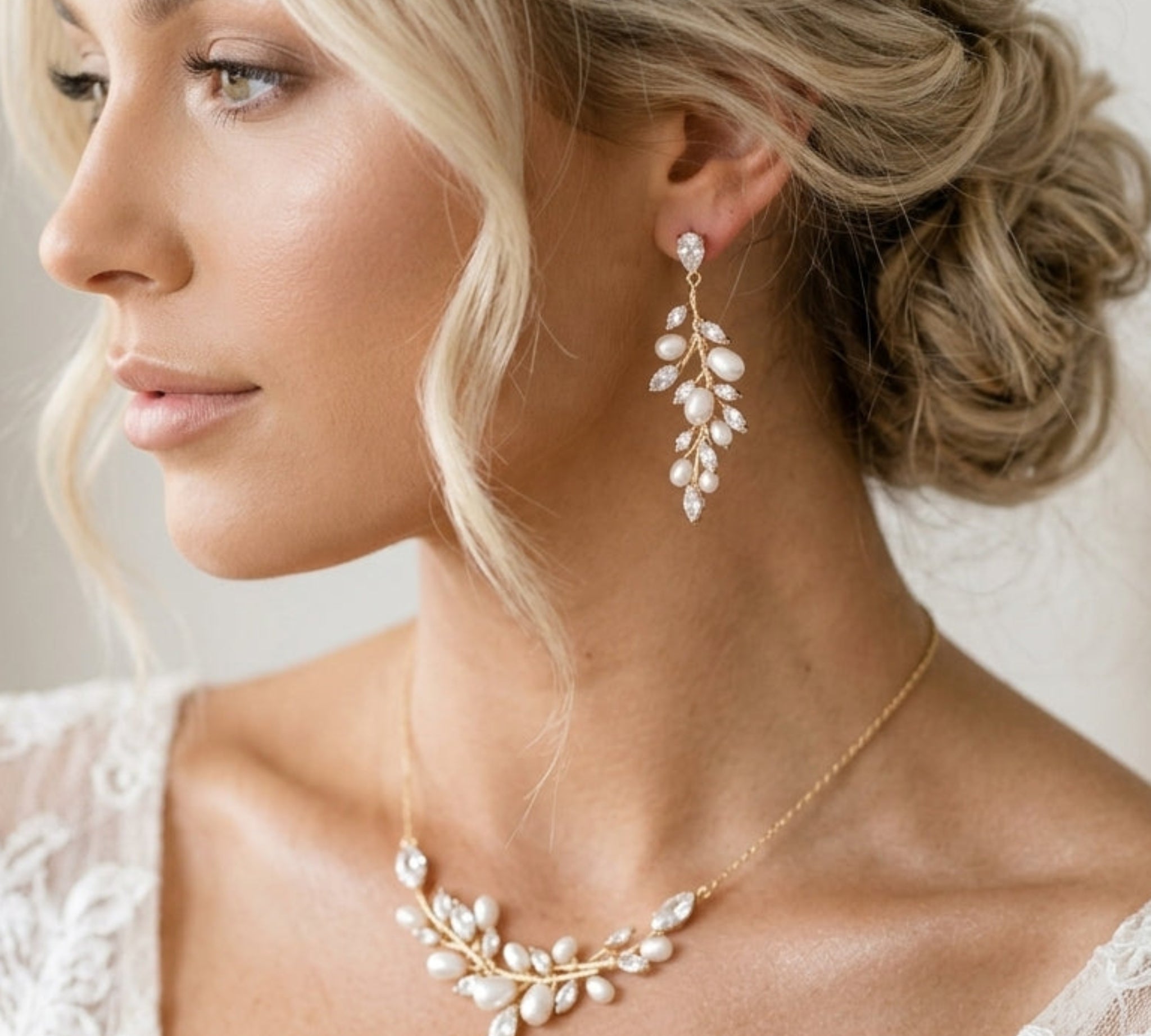 Treasures by Agnes Aprille bridal necklace and earrings set featuring genuine freshwater pearls and sparkling cubic zirconia in a delicate gold floral design