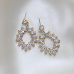 Treasures by Agnes Odette gold plated bridal earrings featuring sparkling marquise cut cubic zirconia in an elegant open teardrop design.