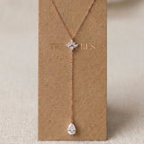 Emma rose gold CZ lariat bridal necklace with sparkling crystal accent and teardrop CZ drop by Treasures by Agnes.