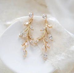 gold bridal earrings with marquise cut clear crystals in an elegant branch drop design by Treasures by Agnes
