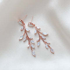 Long rose gold vine earrings with white opal crystals - APRILLE - Treasures by Agnes